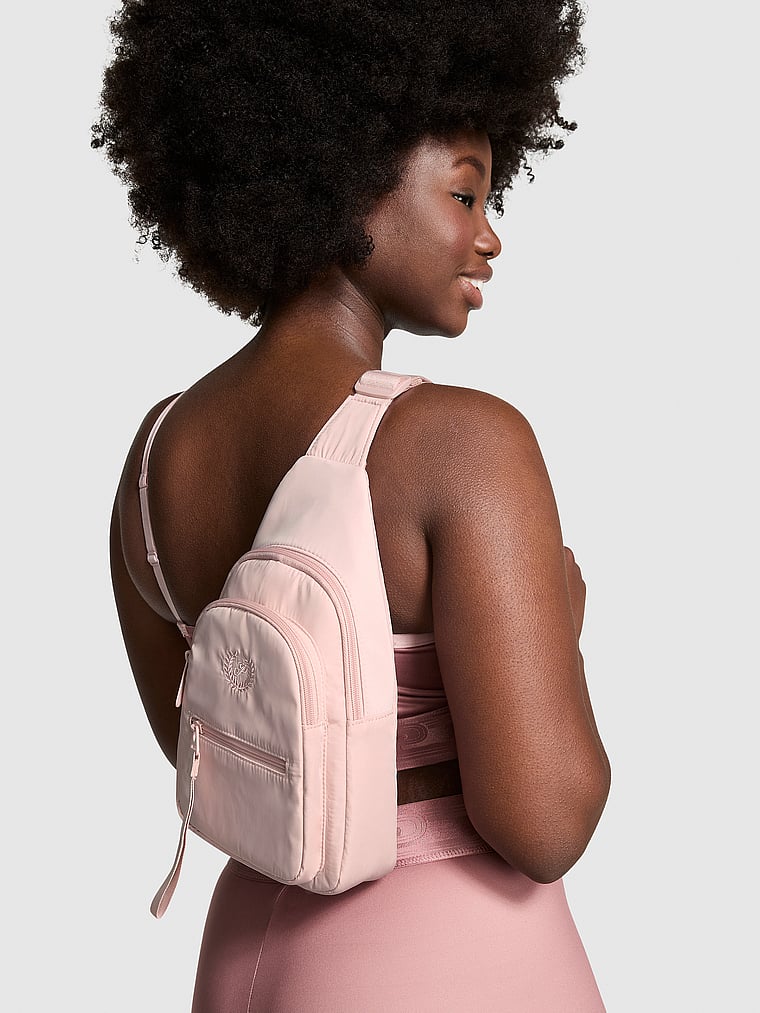 PINK Mini Nylon Sling Backpack, onModelSide, 3 of 4